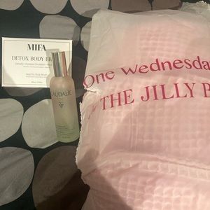 Three items from Spring 2024 Jilly Box. XL Robe, Elixir and dry brush.